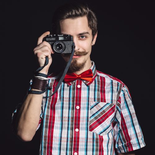 portrait of a cheerful photographer in studio 2021 08 26 15 54 44 utc